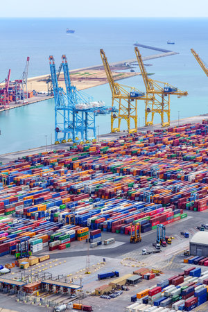 Barcelona Harbor, Spain, August, 25, 2022: Thousands of containers of goods waiting to be loaded by the cranes on the ships.のeditorial素材