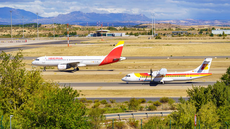 Madrid, Spain, October 30, 2022: Iberia aircraft circulating on the runways of Madrid Barajas airport.のeditorial素材