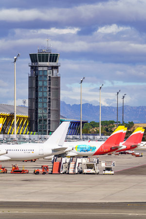 Madrid, Spain, October 30, 2022: Madrid Barajas Airport International Terminal with rows of parked aircraft.のeditorial素材
