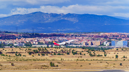 Madrid, Spain, October 30, 2022: Plane of the airline Iberia taking off from Barajas airport.のeditorial素材