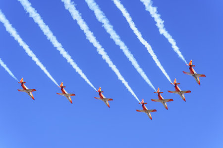 Madrid, Spain, October 12, 2022: Spanish army planes doing aerobatics in the air in a military parade.のeditorial素材