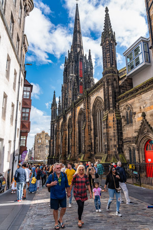 Edinburgh, Scotland, UK, August 22, 2023: Tourists strolling along Castlehill Street on a summer day.のeditorial素材