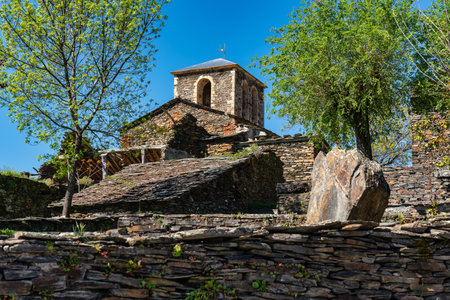 Church tower in the northern highlands of Guadalajara, Campillo Ranas, Spain.の写真素材