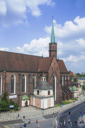 Church in Wroclaw, in Poland Street, along the road, with people who go to multiple sitesのeditorial素材