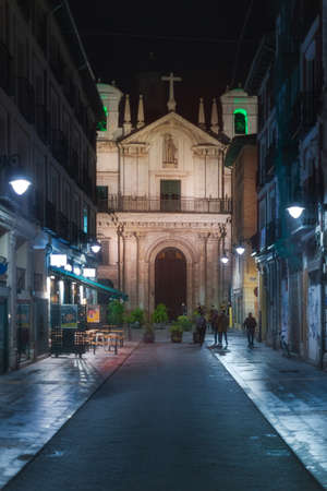 Night vertical view of the Church of Santa Vera Cruz and Plateria street in the city of Valladolid, Spainの写真素材