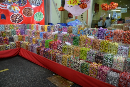 Typical Chinese New Year goodies sold at the Chinatown Night Street Market   This street is where Chinese New Year goodies are sold and the very centre of CNY celebration in Singapore   Chinatown, Singapore 18 Jan 2013 のeditorial素材