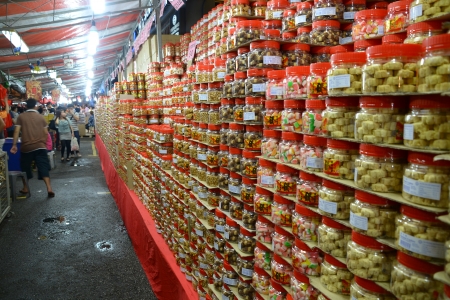 Typical Chinese New Year goodies sold at the Chinatown Night Street Market   This street is where Chinese New Year goodies are sold and the very centre of CNY celebration in Singapore   Chinatown, Singapore 18 Jan 2013 のeditorial素材