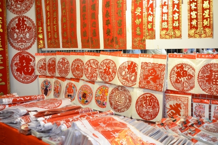 Chinese would decorate their residences to prepare for visiting by relatives and friends during CNY.  These decoration are sold at the Chinatown Night Street Market, the epicentre of CNY celebration in Singapore.  Chinatown, Singapore, 18 Jan 2013のeditorial素材