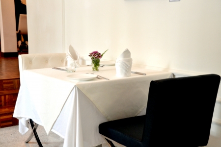 Contemporary Elegant black and white restaurant tables のeditorial素材