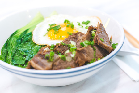 Porky Bowl Homemade char siu with rice and sunny side up & siew pak choy
