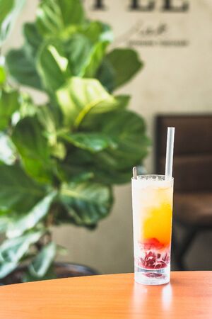 Calpis Soda Fizz with Red Tea Jelly and Passionfruit Pureeの写真素材