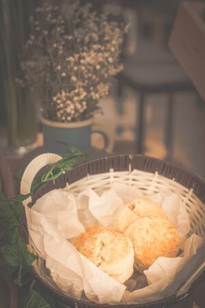 delcicious decorated  display of cakes, cookies, scones and confections in a bakeryの写真素材