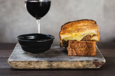 Braised Shortrib Grilled Cheese.  A blend of gruyere and taleggio cheese sandwiched between buttery...
