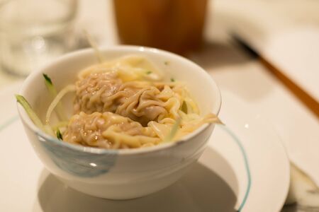 pork and parmesan flavoured with truffle dumpling with cucumber slicesの写真素材