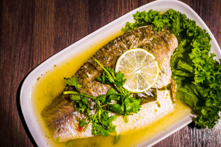 Thai Steamed Seabass fillet with Lime and Chilli and topped with special sauce.