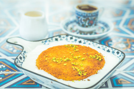 Kunafa Traditional middle eastern dessert made from cheese pastry soaked in sweet sugar-based syrupの写真素材