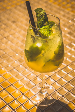 Coconut with Mojito and coconut flesh served in a wine glassの写真素材