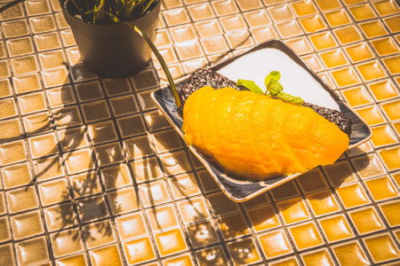 Mango Sticky Rice with black sticky rice, fresh mango and creamの写真素材