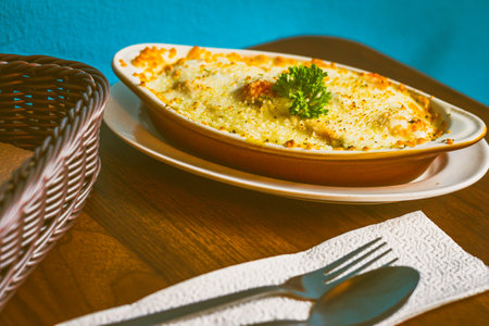 Gulai Salmon Baked Rice Rice baked in creamy and flavourful gulai Padang sauce with salmon and...