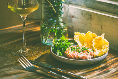 Fjord Trout tartare with alabama white sauce, dill arugula salad, belinjoの写真素材