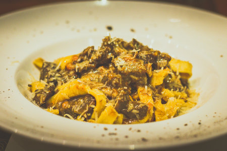 TAGLIATELLE pasta with minced BEEF CHEEK slow-cooked in red wine sauceの写真素材