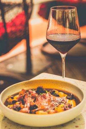 Red Wine Chicken Coq Au Vin) Courgettes, eggplant, tomato, capsicum, puff pastry, saladの写真素材