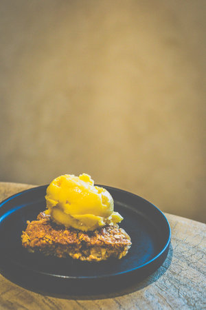 Apple Crumble with Mango SorbetGranny Smith apple crumble with warm, spiced filling and a crisp...
