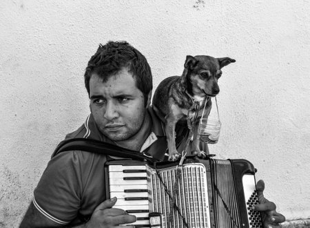 in the city of lisbon or found this street artist and his curious friend who is in charge of...