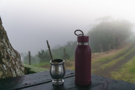 Drinking south american mate in the top of the cloudsの写真素材
