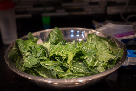 Greens in Bowl of Waterの写真素材