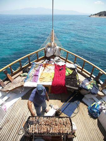 A traditional Souflaki barbecue on the board of a greek ship.の写真素材