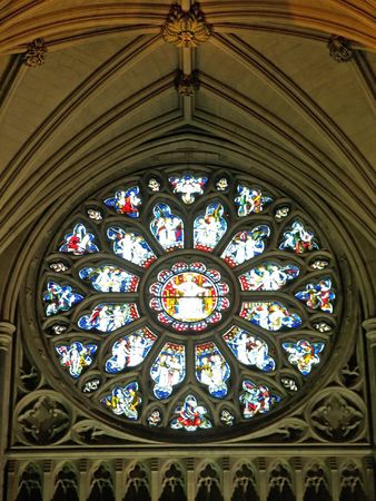 Religious illustrations on stained glass in a church.のeditorial素材