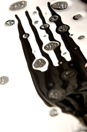 distorted with white background and foam fork, distorted by putting it in water with soapの写真素材