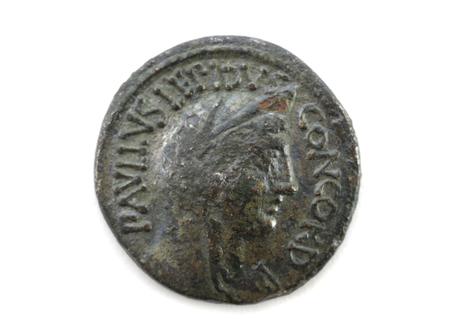 a Roman coin obverse of copper from a exacavacion the Mediterranean, Spainの写真素材