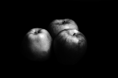 trhee apples with black and white, fruitの写真素材