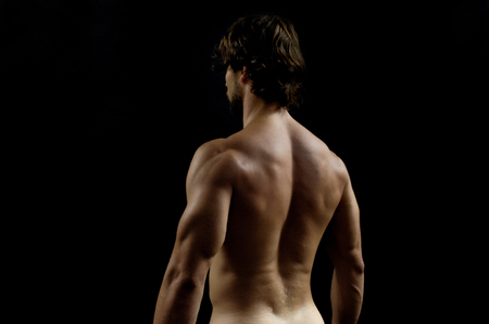 studio photography of a man with His back,の写真素材