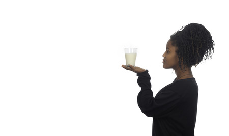 teenage girl drinking milkの写真素材