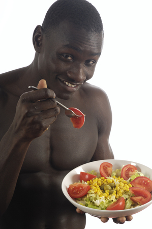 black man naked with salatの写真素材