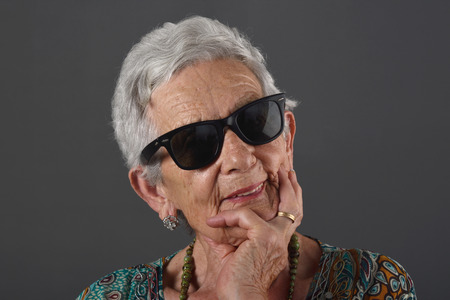 Portrait of a senior  woman with glassesの写真素材