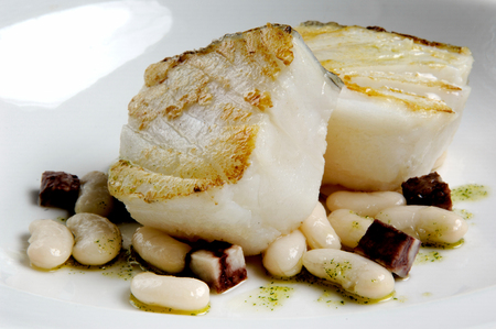 Hake with garnishの写真素材