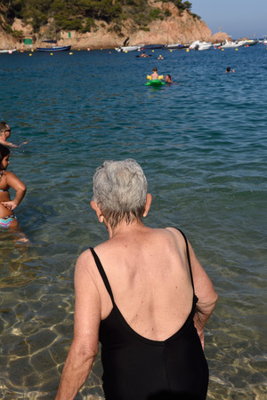 Senior woman on the beachの写真素材