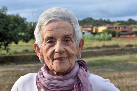 portrait of a senior woman outdoorの写真素材