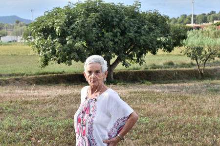portrait of a senior woman outdoorの写真素材