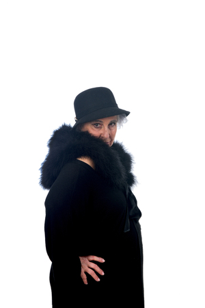 senior woman with hat on white background