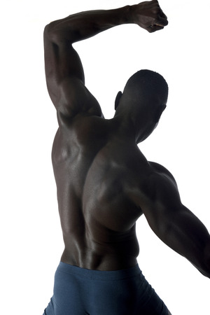 portrait of a black athletic man on his backの写真素材