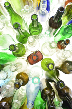 top view of glass bottles on whiteの写真素材