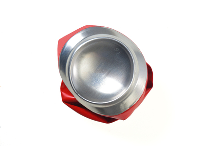 red aluminum can flattenedの写真素材