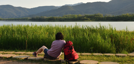 Hiker woman resting after walking