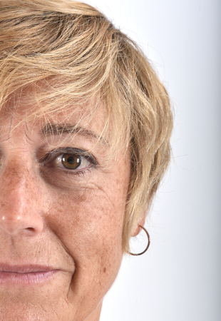 close-up of the face of a middle-aged womanの写真素材