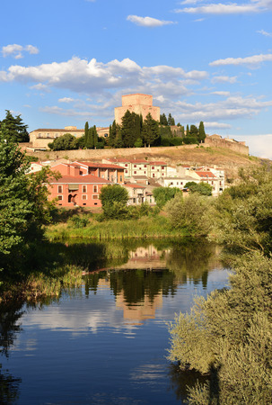 view of bridge and the Castle of Henry II of Castile (14th century) and River Agueda, Ciudad Rodrigo, Castile and Leon, Spainのeditorial素材